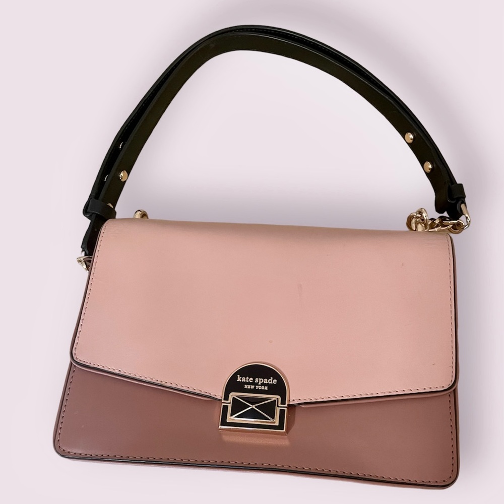 Two tone pink Kate Spade crossbody bag with convertible strap.